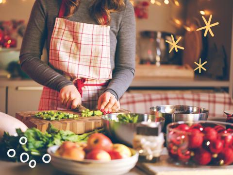 chopping food in holiday kitchen